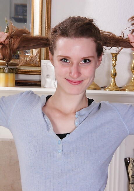 Sexy teen Tara Estell in sexy skirt reveals small tits and shaved pussy 